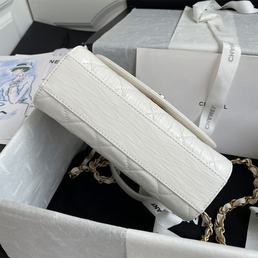 Ch*el mini flap bag with top handle
